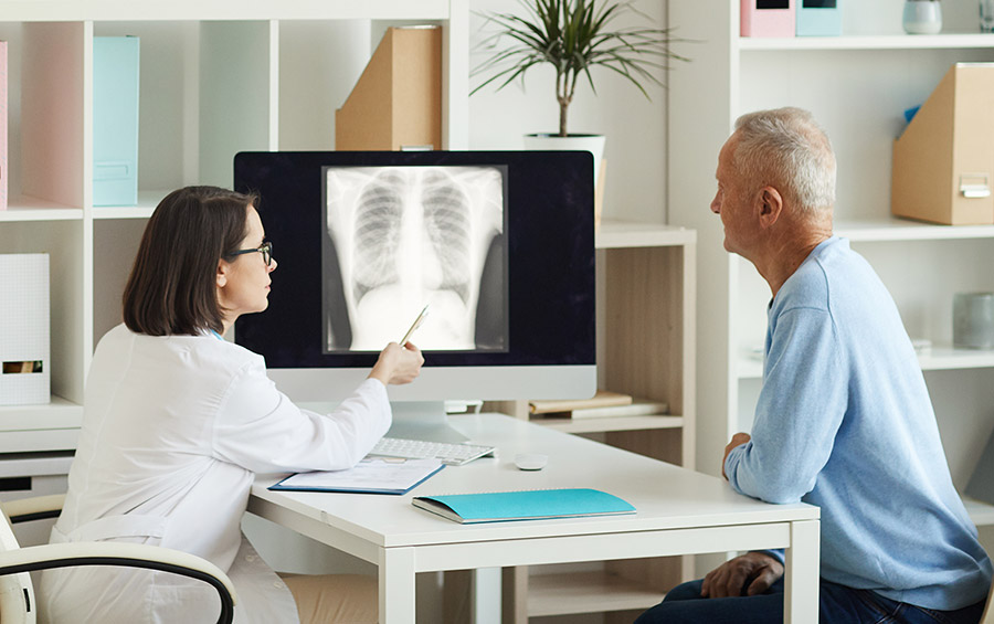 Doctor Showing X-Ray